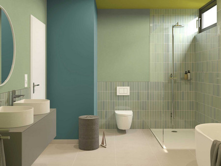 Modernes Badezimmer mit blaugrünen Fliesen, begehbarer Dusche, zwei Waschbecken und einer Wandtoilette