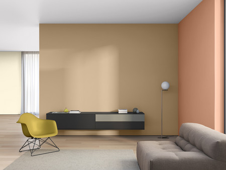 Nowoczesny i stylowy salon o jasnym, minimalistycznym wystroju. Po lewej stronie znajduje się zielone krzesło, a po prawej szara sofa.